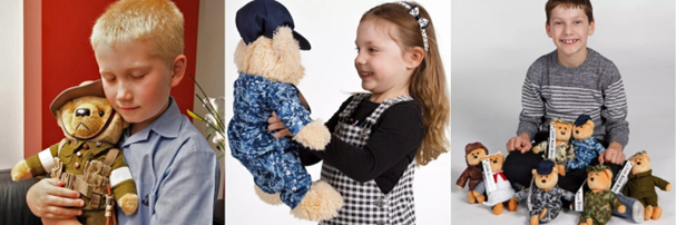 A child holding a stuffed animal
Description automatically generated