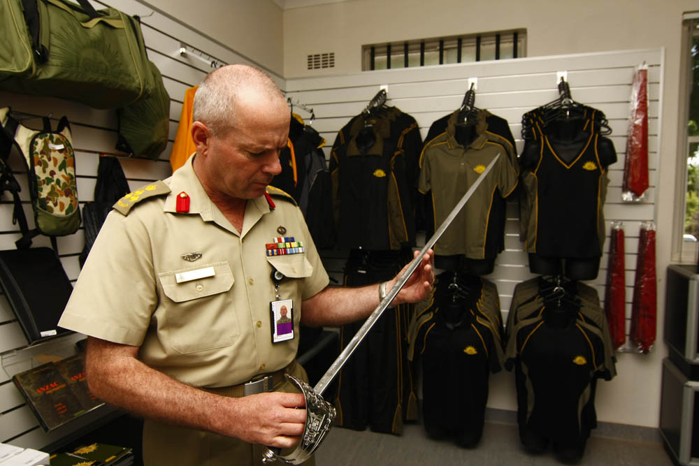 Brigadier M.J. Moon, DSC, AM Commandant RMC Duntroon (2009-2010) inspecting ceremonial swords