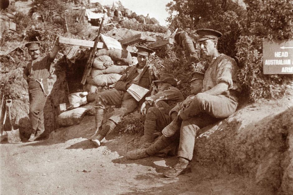 Gallipoli Peninsula, Turkey, May 1915. Five unidentified soldiers sitting on the road up to Plugge’s Plateau.