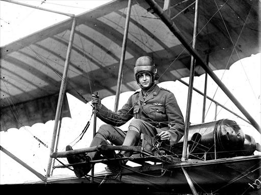 Australian Army pilot Henry Ralfe at the controls of the original Point Cook Boxkite