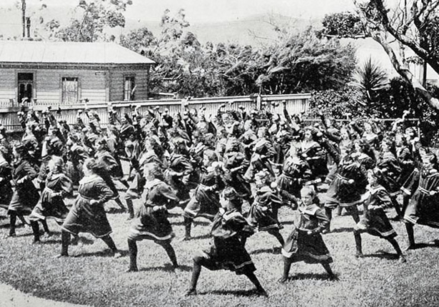 Kiwi kids performing physical drills at school during the Great War.
