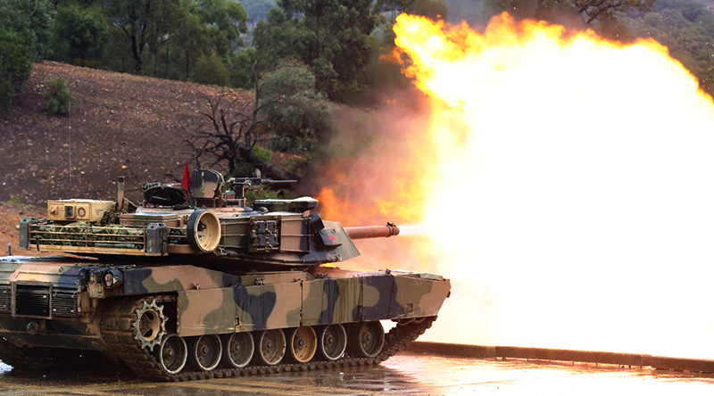 An Australian Army M1A1 Abrams tank fires during Exercise Jericho Dawn 2016. Photo by Sergeant Pete Gammie
